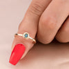 14K gouden solitaire ring met blauwe diamanten