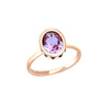 Close-up of amethyst gemstone in 14K solid gold setting