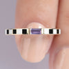 Close-up of 14K solid gold ring featuring amethyst and enamel
